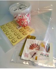 kit 100 cornets à bonbons,stikers merci,et pastilles mixte rose en chocolat kit 100 cornets à bonbons,stikers merci,et pastilles mixte rose en chocolat
