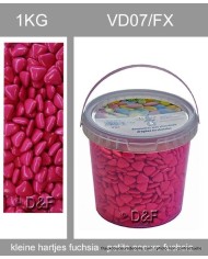dragées 1 kg petits coeurs fuchia.